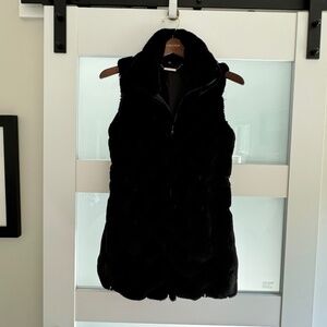 White House Black Market faux mid-length fur vest.  Black.  Size XS.